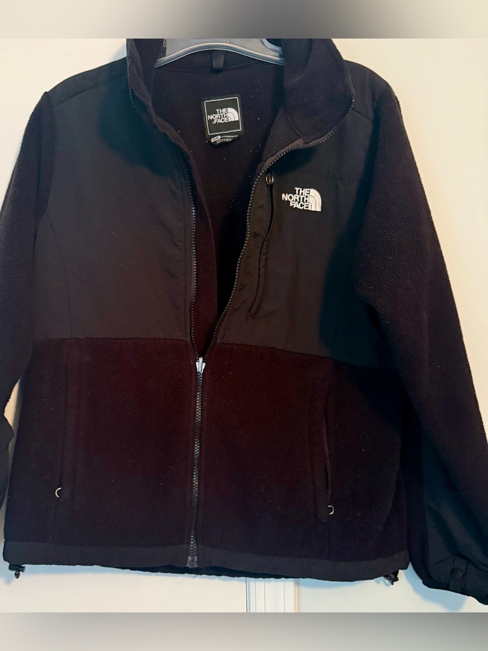 The North Face black full zip jacket. size is medium.